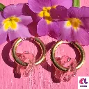 Boucles d'oreilles créoles fleur rose pailletée