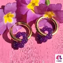 Boucles d'oreilles créoles fleur violette pailletée